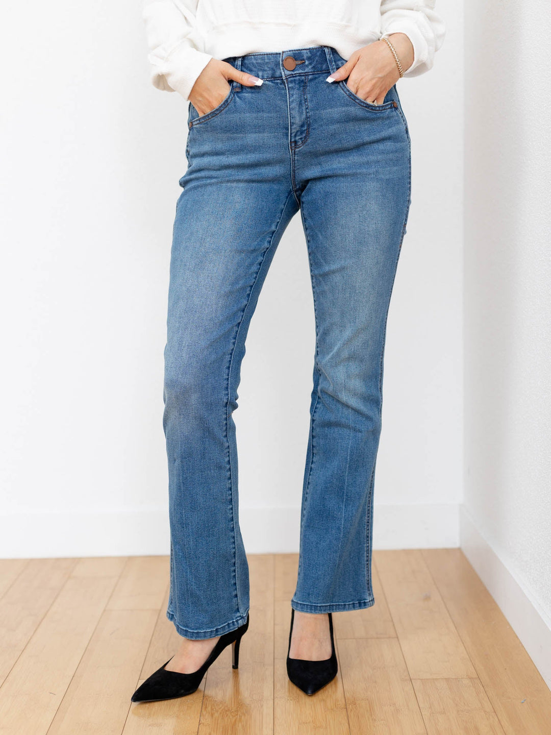 medium wash bootcut side seam detail denim