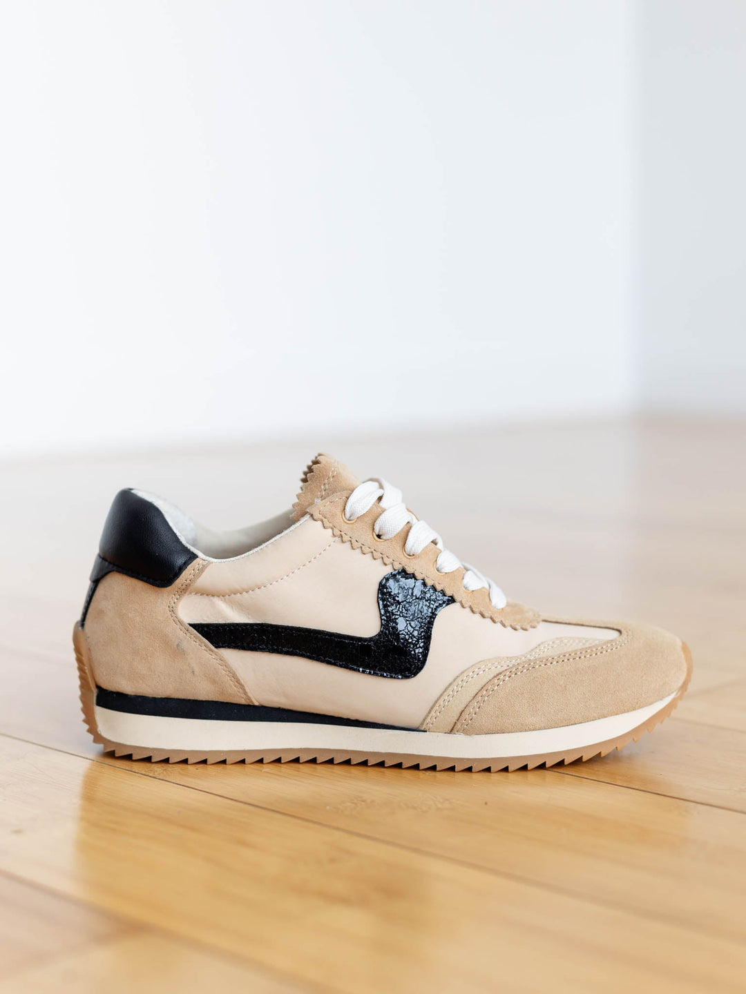 neutral tan and black retro sneaker