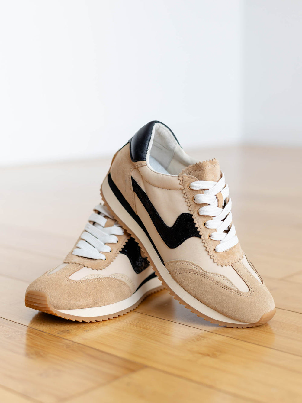 neutral tan and black retro sneaker