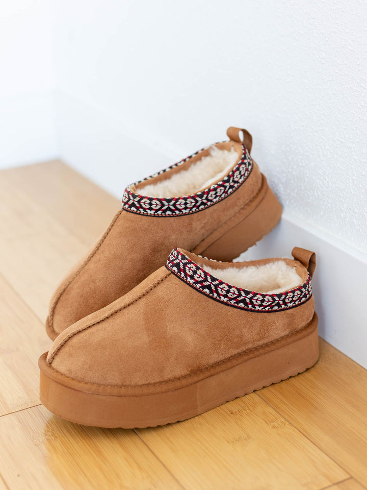 tan furry slip on shoe