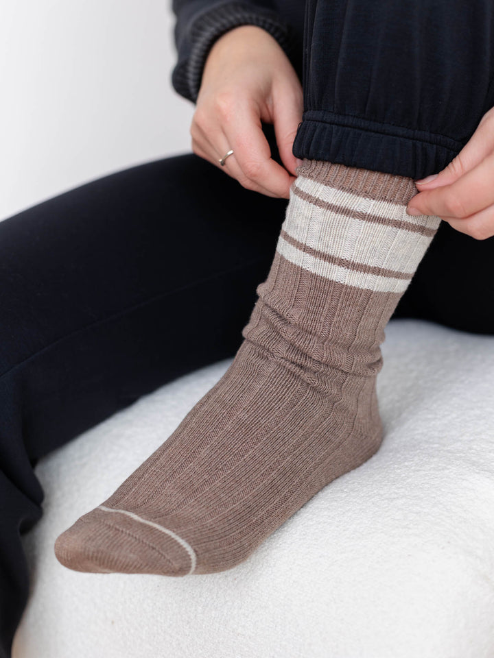 brown and white varley socks