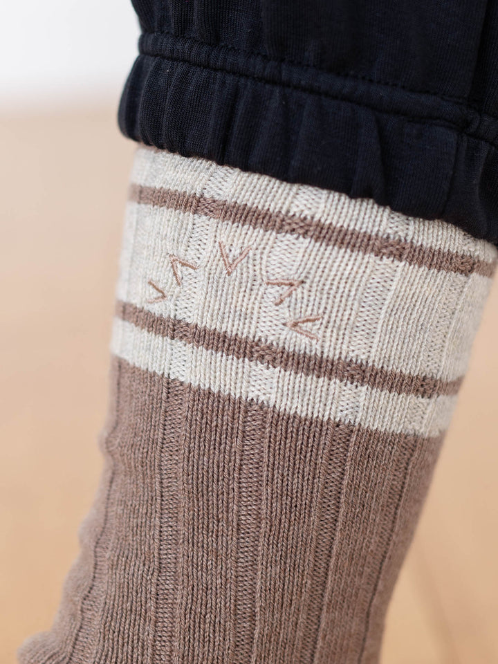 brown and white varley socks